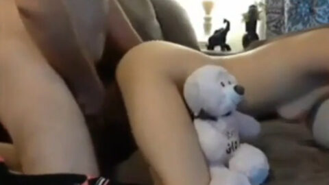 Nude teen daughter on all fours on her bed while father penetrates her from behind in amateur incest scene