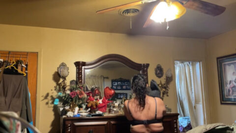 Hidden camera footage of real mother undressing in bedroom filmed secretly by son