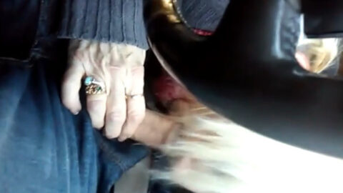 Mature aunt kneeling in car giving blowjob to her nephew after airport pickup, taboo family reunion scene