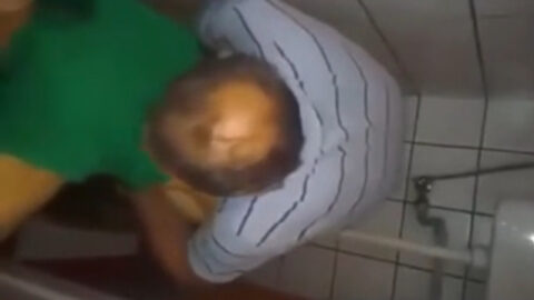Older father and young daughter in bathroom during amateur homemade taboo family video