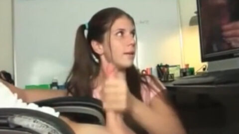 Amateur sister giving her real brother a slow handjob on the couch