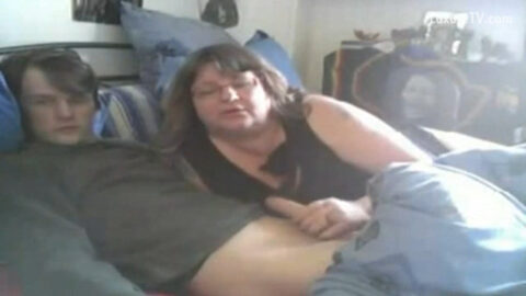 Mother on her knees giving her son a sloppy blowjob in homemade taboo family video